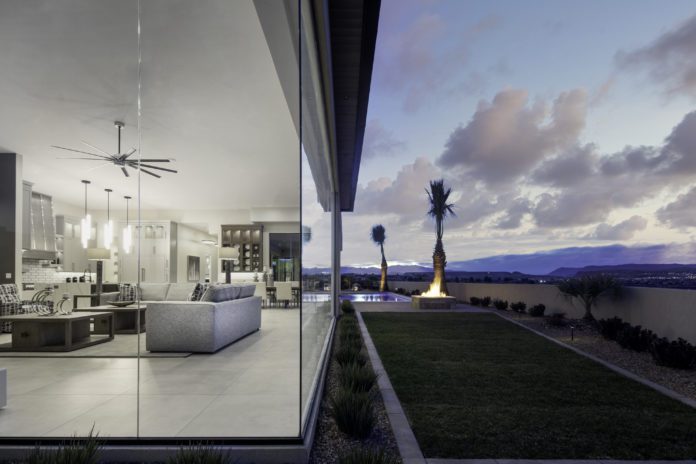 Pool and home exterior by Anderson Custom Homes